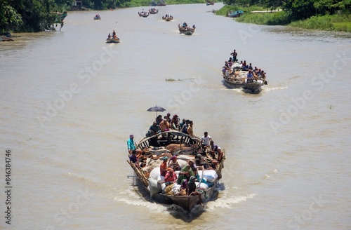 Some images can't be discribed.some moment has'nt any explanation.This captur is such kind of them.
In this picture we can see that a full of boat is on the way of a hat. photo