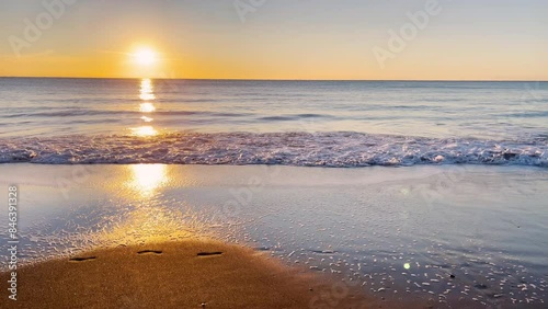 Wallpaper Mural Sunset at beautiful sea with waves on the beach Torontodigital.ca