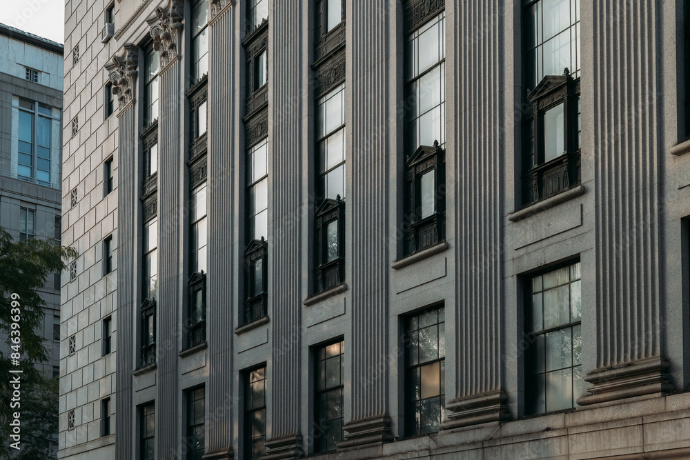 Classic architectural building facade in New York City downtown Classic architectural building facade in New York City downtown