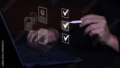 Digital Checklists for efficient business management, Businessman touching marking on checklist guide to paperless assessment and Future Success, streamlining operations with online surveys.