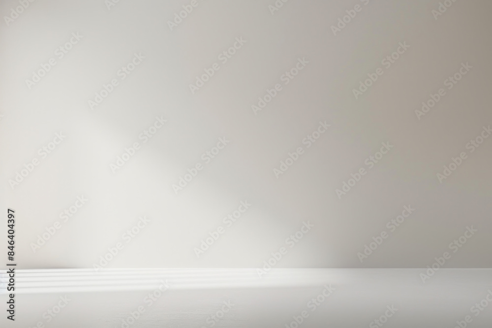 A white wall with a window in the middle. The window is letting in light, creating a bright and airy atmosphere A white wall with a window in the middle. The window is letting in light, creating a bright and airy atmosphere