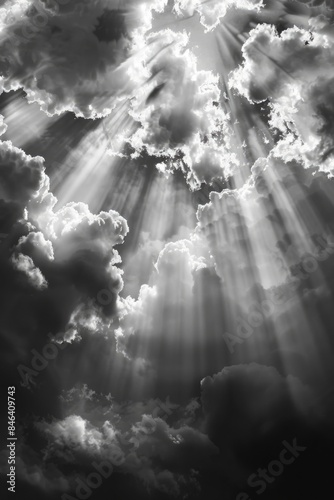 The sky is filled with clouds and the sun is shining through them