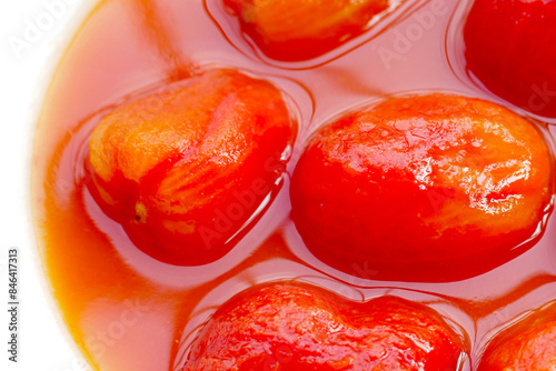 Whole peeled tomatoes in tomato juice © Bowonpat