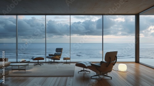 A modern living room wooden floor and a large window overlooking the ocean.