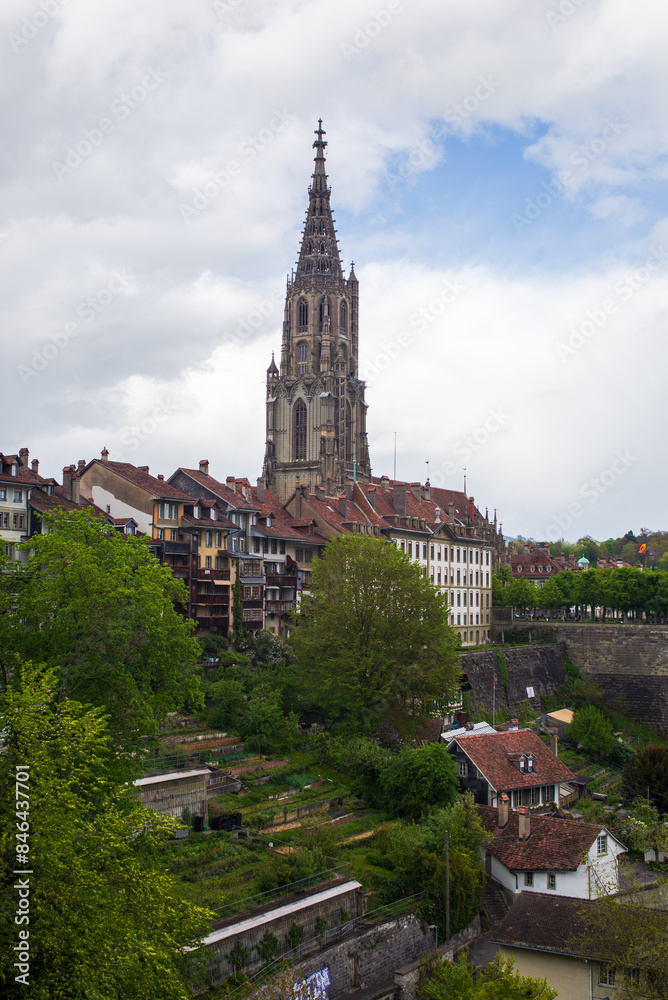 Cathedral of Bern against the background of the cloudy sky. Switzerland Cathedral of Bern against the background of the cloudy sky. Switzerland