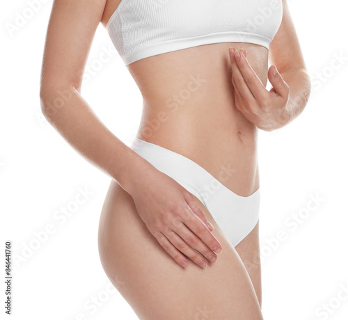 Woman with slim body posing on white background, closeup