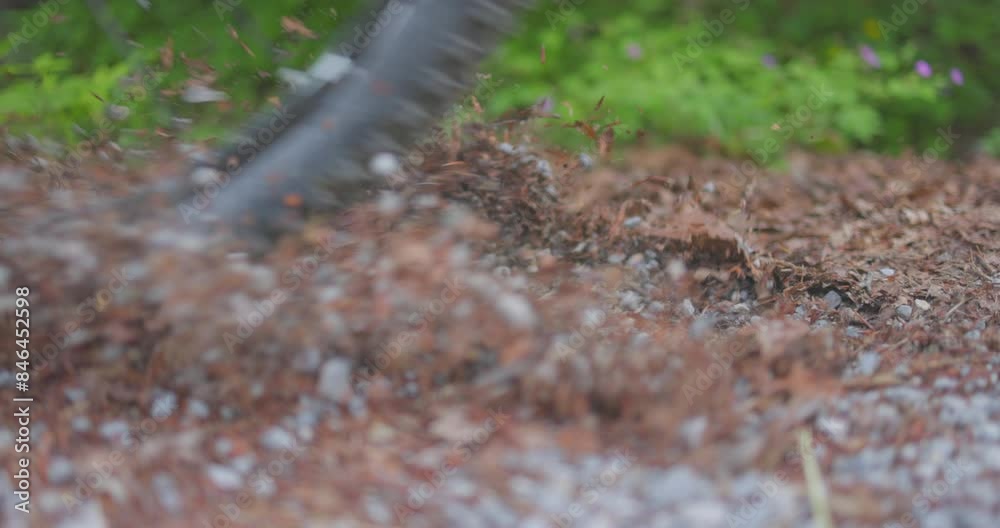 Close-up, slow-motion shot depicts a cyclist riding through a park and sliding gracefully. Close-up, slow-motion shot depicts a cyclist riding through a park and sliding gracefully.