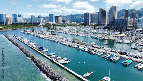 this is an aerial view of a marina with boats docked