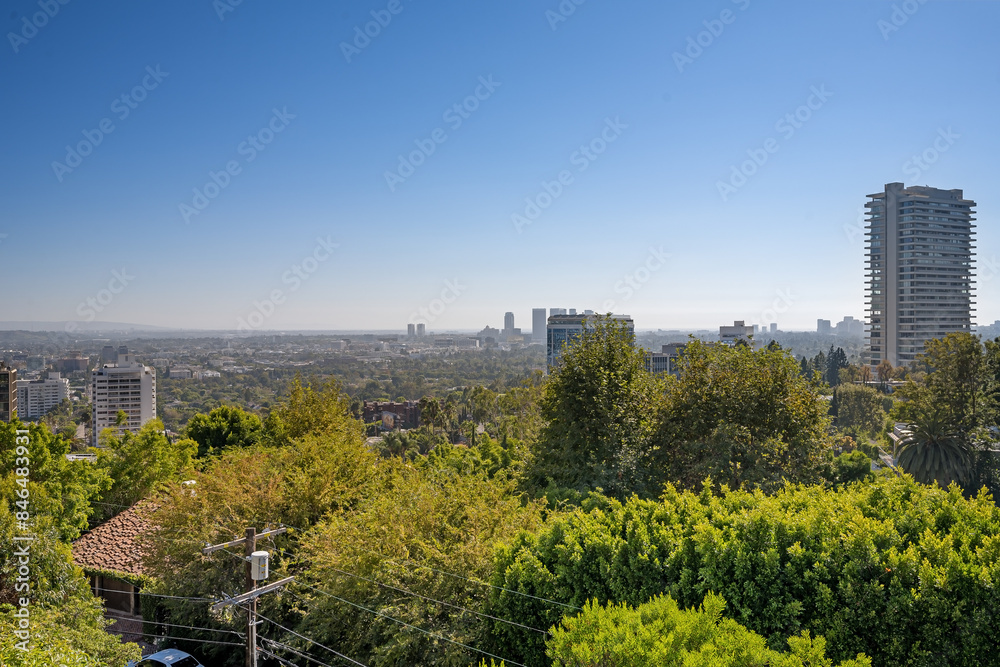 Fototapeta premium Aerial view of a hilltop building with tree surroundings