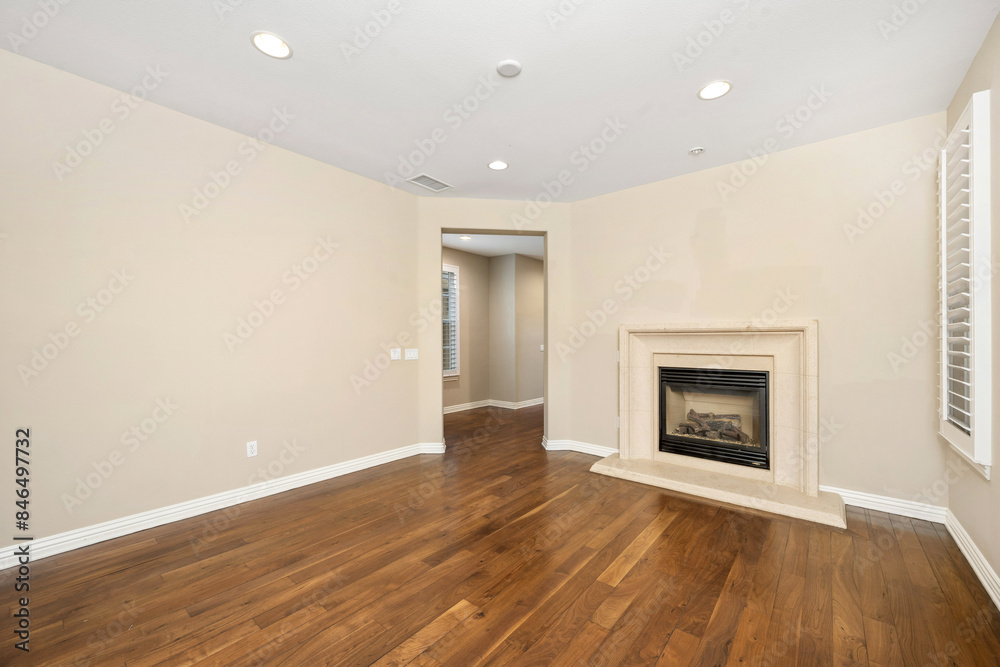 Fototapeta premium Spacious room with hardwood floors and a fireplace. California, USA