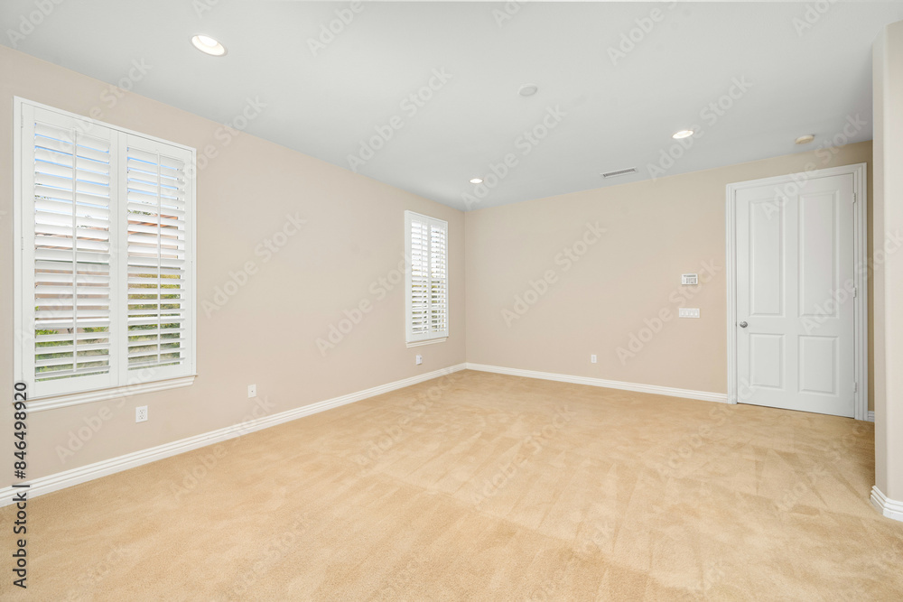 Obraz premium Empty room with tan walls and windows. California, USA
