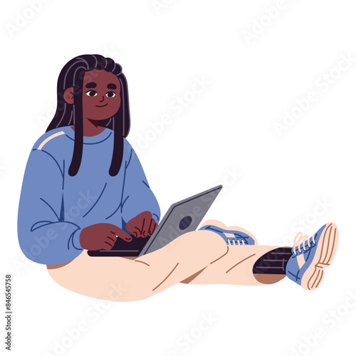 Black student with dreadlocks sits on floor, holds laptop. Happy teenager typing on computer, communicates online. Cute teen learning with remote education. Flat isolated vector illustration on white