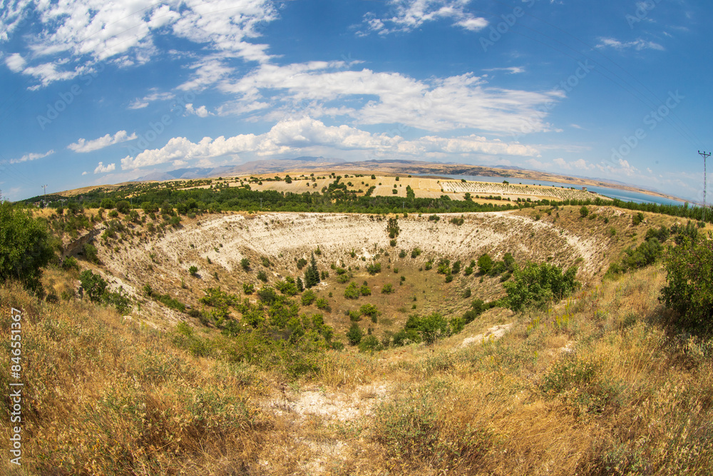 The pit called Kup, which is said to have been formed as a result of a meteorite fall, is a karstic sinkhole.