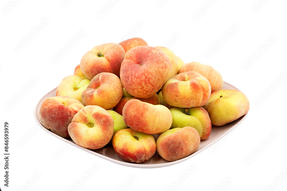 Flat peach or donut peach (Prunus persica var. platycarpa) is a variety of peach with pale yellow fruit hat is oblate in shape. Flat peach or donut peach (Prunus persica var. platycarpa) is a variety of peach with pale yellow fruit hat is oblate in shape.