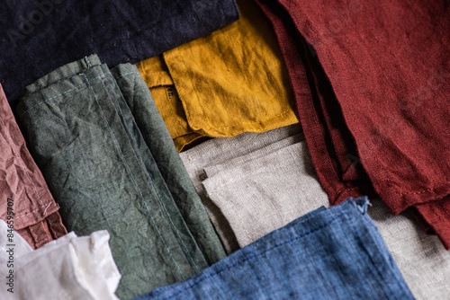 Top view of assorted color textile napkins in flat lay