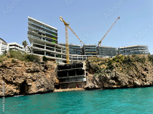 Antalya, Turkey - 22 Aprel, 2024, Beautiful view on the coastline and buldingg a new hotel in Antalya, Turkiye, 