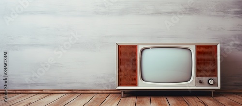 Vintage TV on a white woode...