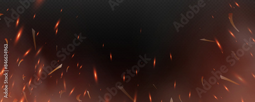 Burning hot sparks effect with embers burning ash and smoke flying in the air. Burning glowing particles. Flame of fire with sparks isolated on a black transparent background. Flame png.
