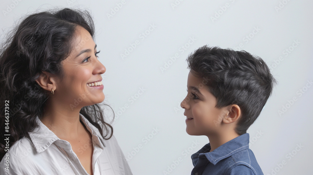 40 year old Latin mother standing to the side looking and smiling at her 7 year old Latin boy son, optimistic faces, in a large space with white background, optimistic faces, photo style 40 year old Latin mother standing to the side looking and smiling at her 7 year old Latin boy son, optimistic faces, in a large space with white background, optimistic faces, photo style