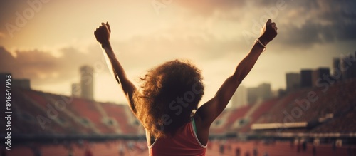 Athletic woman celebrating ...
