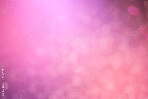 Abstract pink background with de focused light and bokeh effect