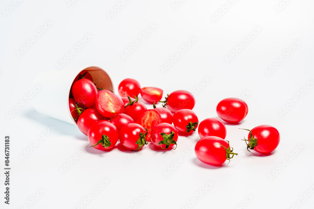 Studio shot photo of cherry tomato against white background Studio shot photo of cherry tomato against white background