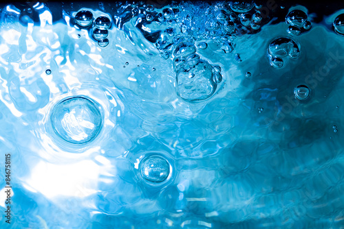 Water bubbles abstract bokeh light in the pool