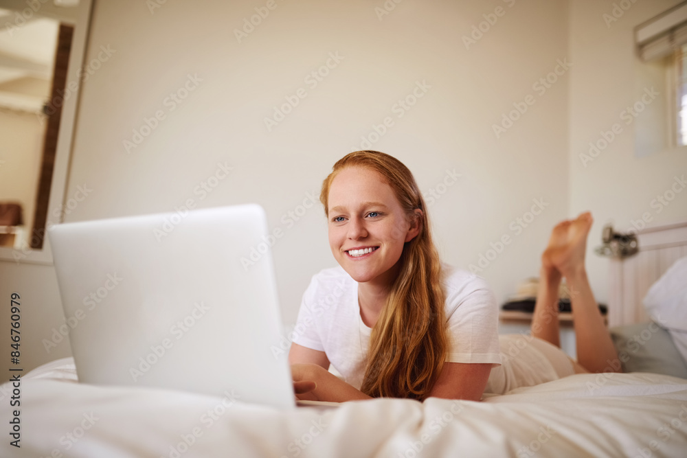 Girl, laptop and social media for networking while on bed, searching and home for browsing for movie. Laugh and smile at streaming site for entertainment, online in bedroom and post blog on website Girl, laptop and social media for networking while on bed, searching and home for browsing for movie. Laugh and smile at streaming site for entertainment, online in bedroom and post blog on website
