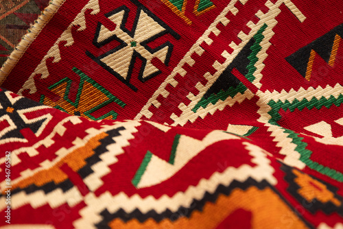Red traditional rug, close up