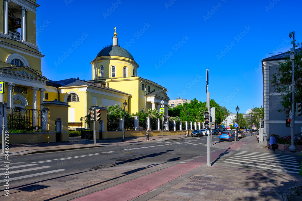 Bolshaya Nikitskaya Street in center of Moscow in Russia. Cozy cityscape in Moscow. Architecture and landmarks of Moscow.