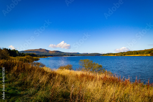 Looking north over Carron Valley reservoir in Stirlingshire, Scotland, on a beautiful, sunny autumn day photo