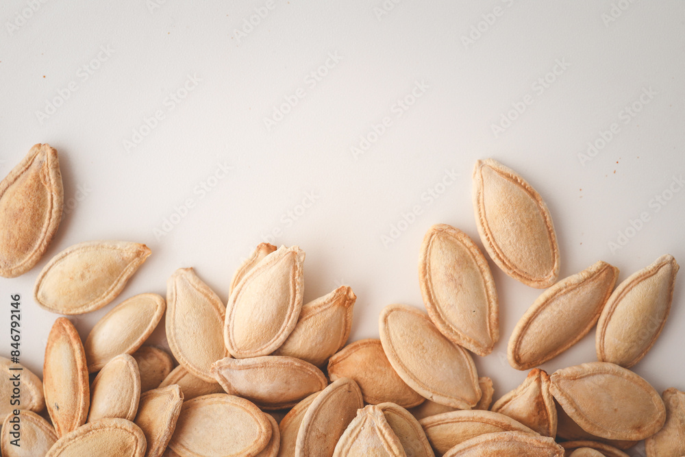 Pumpkin seeds on white background Pumpkin seeds on white background