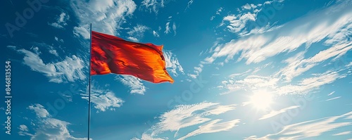 Mongolia flag flying against a bright, blue sky photo