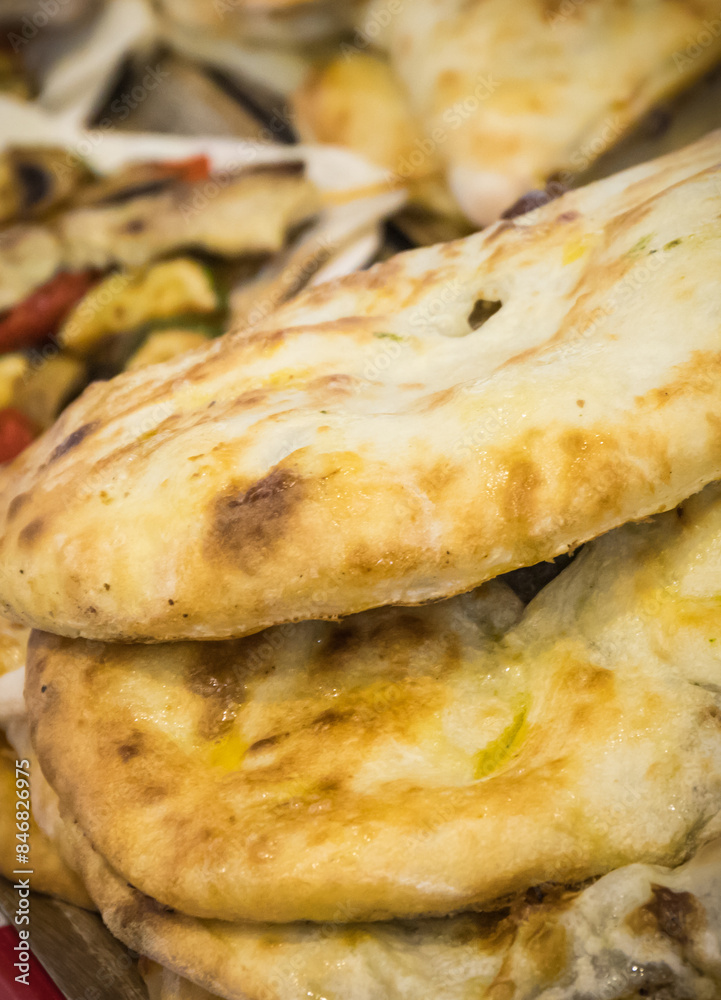 Aromatic khachapuri with chicken and vegetables. Traditional dish of Georgian cuisine Aromatic khachapuri with chicken and vegetables. Traditional dish of Georgian cuisine