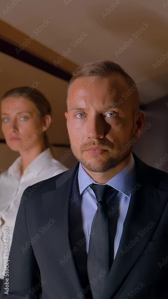Three confident business people inside of private jet. Female and two males epicly turning heads to the camera. Super slow motion. Vertical shot. Three confident business people inside of private jet. Female and two males epicly turning heads to the camera. Super slow motion. Vertical shot.