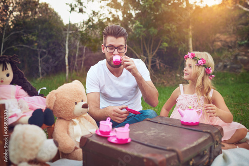 Canvas Print Father, tea party and girl child in garden for nature picnic with toys, teddy bear and suitcase for table