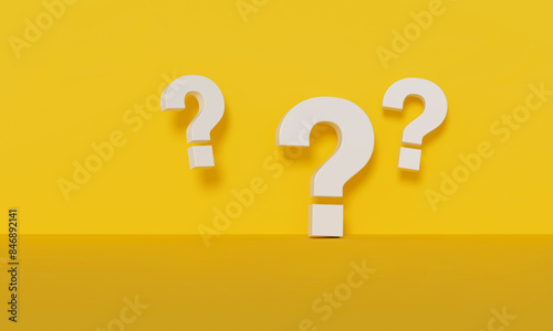 Three White Question Marks on Yellow Background