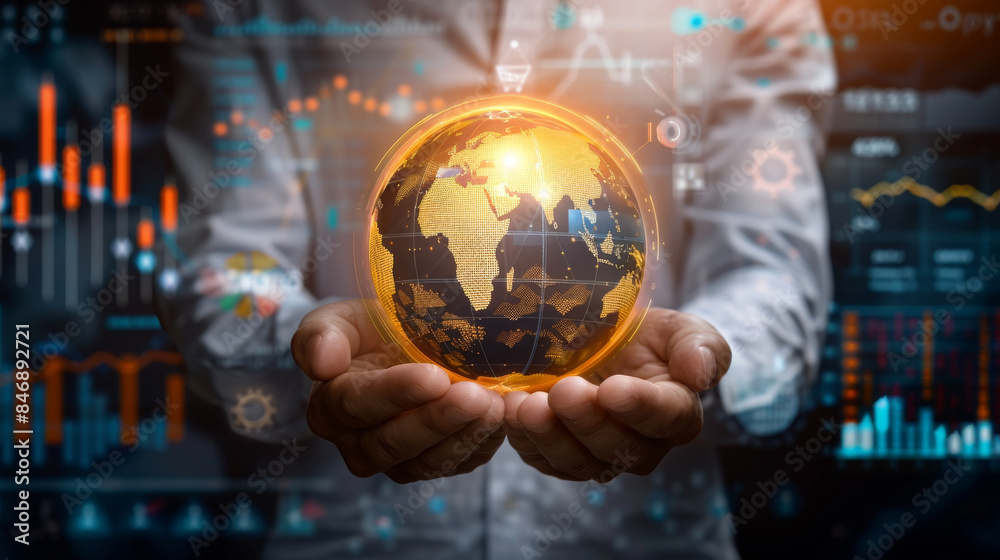 Businessman holding a globe with a bunch of numbers and graphs on it Businessman holding a globe with a bunch of numbers and graphs on it