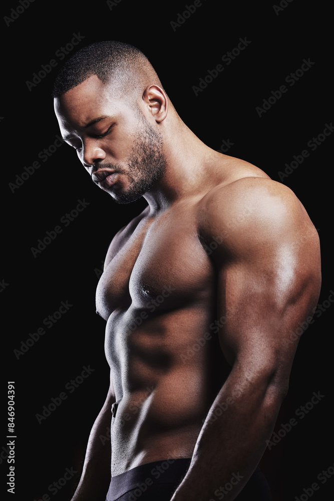Fototapeta premium Thinking, bodybuilder and black man with pride for fitness, health and body care in studio. African athlete, confidence and idea for workout by dark background for wellness, training and results