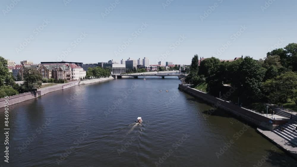 A cruise on the Odra River in Wrocław offers scenic views of the city's historic landmarks and picturesque waterfront. A cruise on the Odra River in Wrocław offers scenic views of the city's historic landmarks and picturesque waterfront.