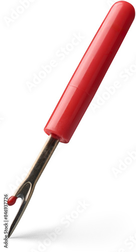 seam ripper or sewing thread remover isolated white background, small tool used cutting and removing stitches with sharp point, curved blade and red handle