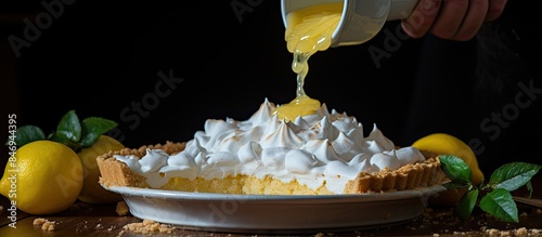 A person is seen pouring le...