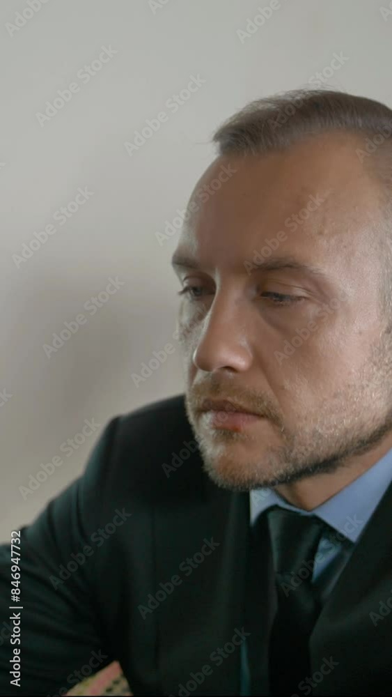 Close-up of Successful businessman travel on his private jet. Entrepreneur work on modern thin laptop on expensive wooden table. Internet surfing in flight. Vertical shot. Close-up of Successful businessman travel on his private jet. Entrepreneur work on modern thin laptop on expensive wooden table. Internet surfing in flight. Vertical shot.