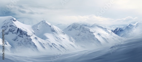 Snow-covered mountains stan...