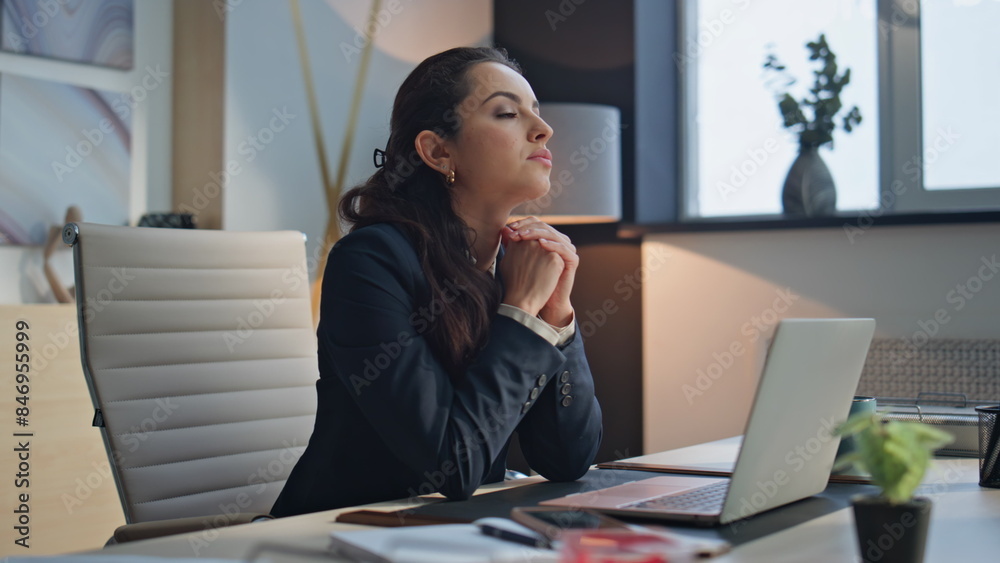 Pensive businesswoman resting desk at workplace. Woman taking break thinking Pensive businesswoman resting desk at workplace. Woman taking break thinking