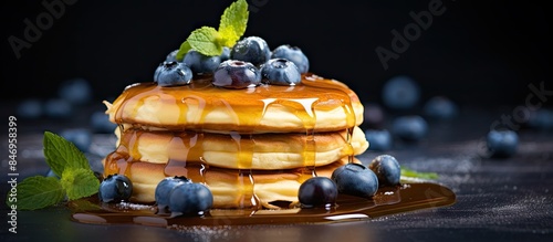 Delicious pancakes topped w...