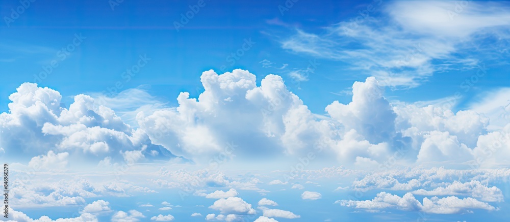 A small boat is cruising in the ocean waters under a cloudy sky, creating a serene and peaceful scene. with copy space image. Place for adding text or design A small boat is cruising in the ocean waters under a cloudy sky, creating a serene and peaceful scene. with copy space image. Place for adding text or design