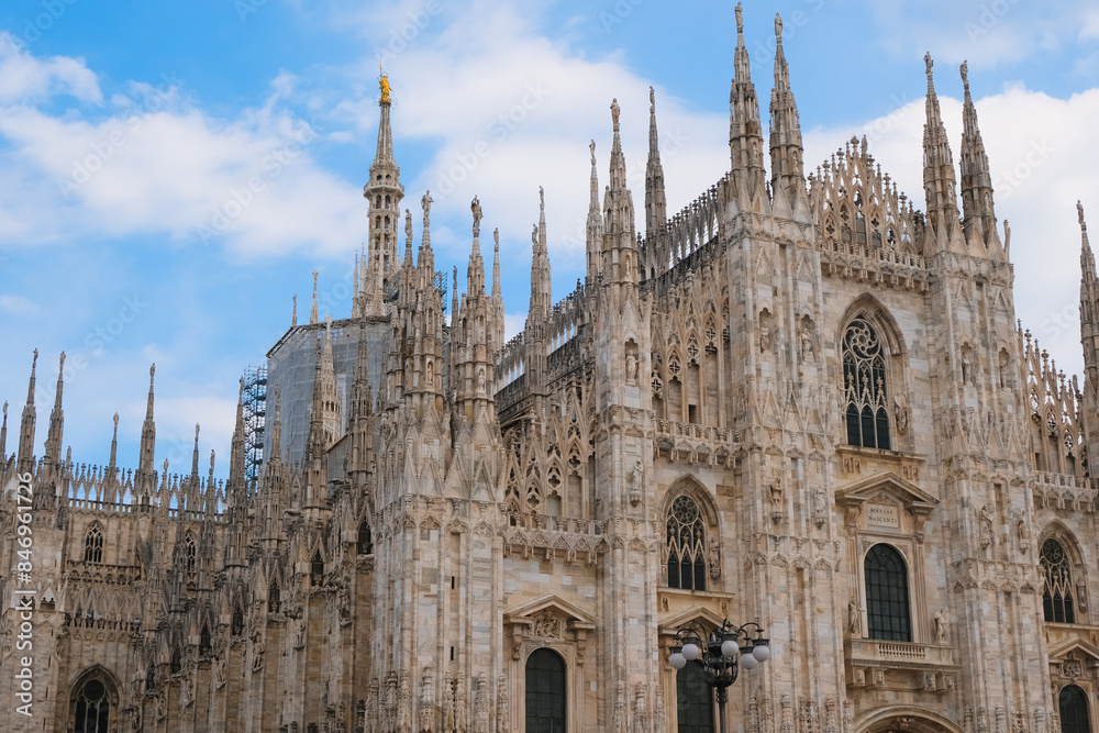 Fototapeta premium duomo di milano cathedral facade exterior top view on sky background