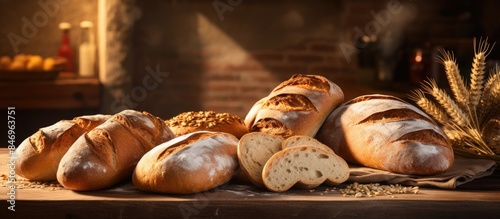 An array of various freshly baked breads displayed on a table, ideal for a delicious breakfast spread. with copy space image. Place for adding text or design