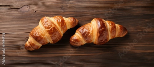 Two freshly baked croissant...
